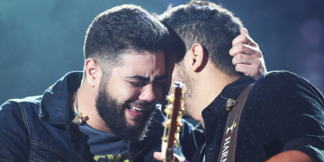 Henrique e Juliano se emocionam ao ouvir cantora com voz igual de Marília Mendonça